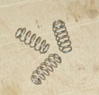 Pressure release spring